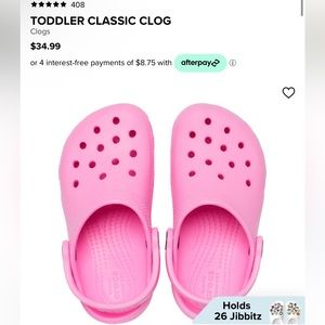Toddler pink Crocs - size 8. Never worn!!!